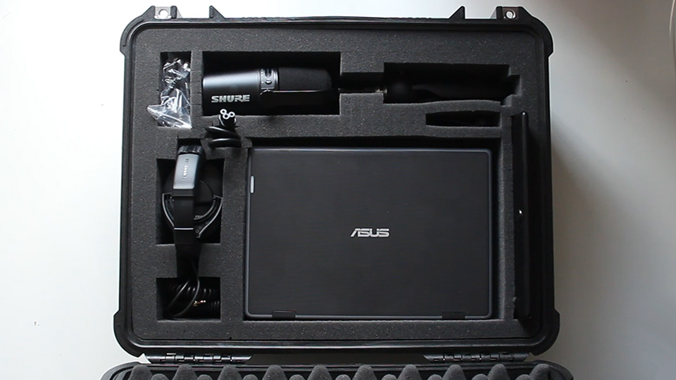 Audiobook in a Box with Shure microphone, laptop and recording equipment